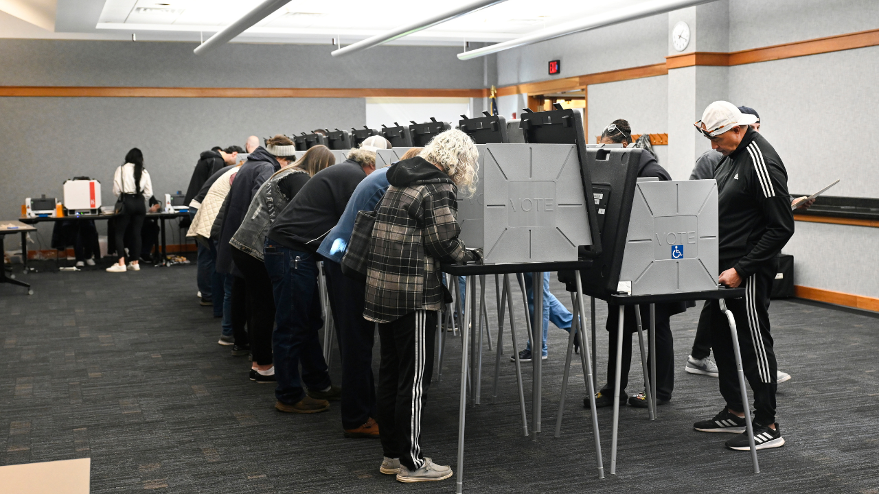 Early voters fill out their ballots