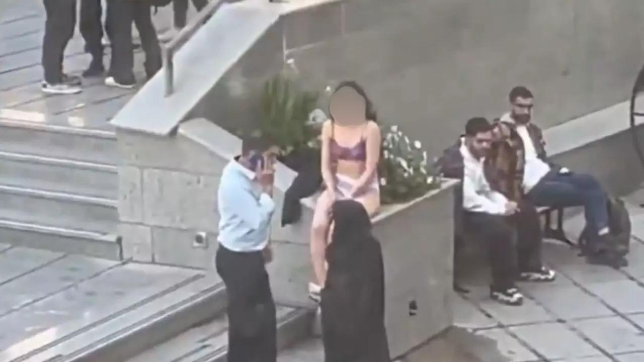 Iran hijab protest_woman strips in underwear