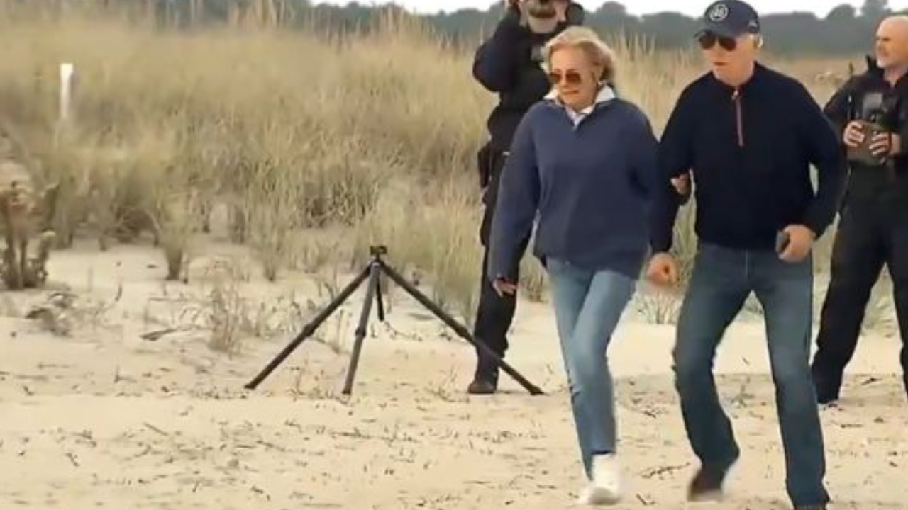 Biden struggles to walk on Delaware Beach