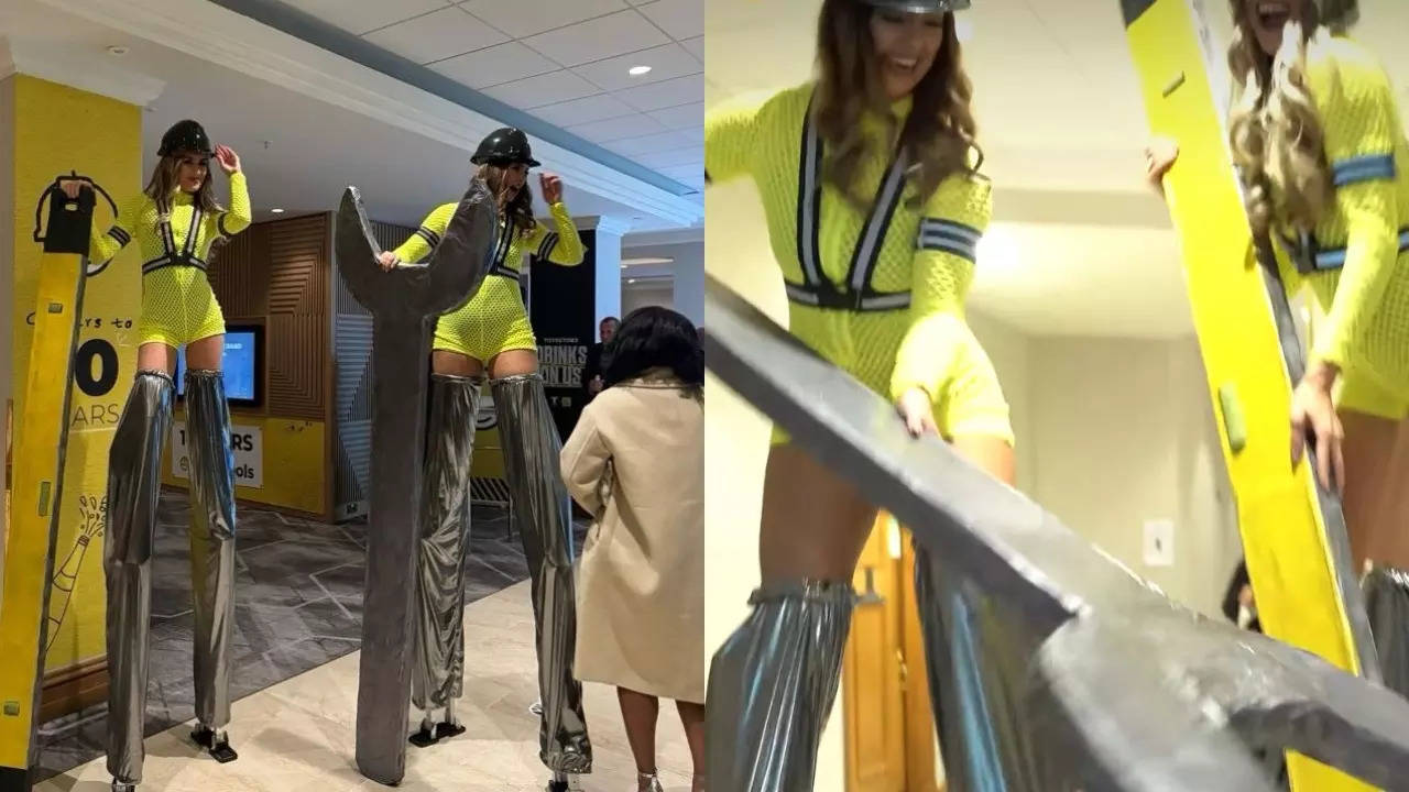 Stilted models in tight-fitting, hi-viz costumes at On The Tools Awards 2024.| Harriet Waley-Cohen