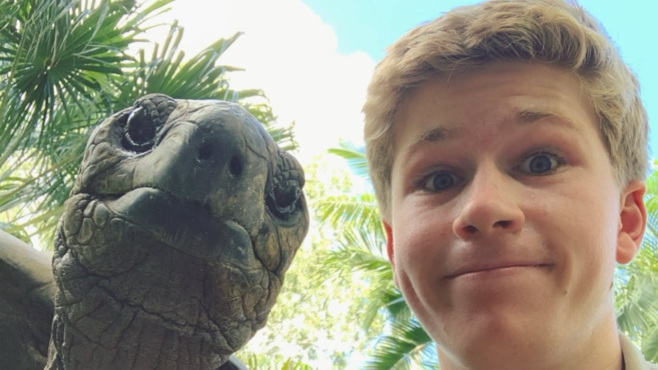 Robert Irwin with a turtle