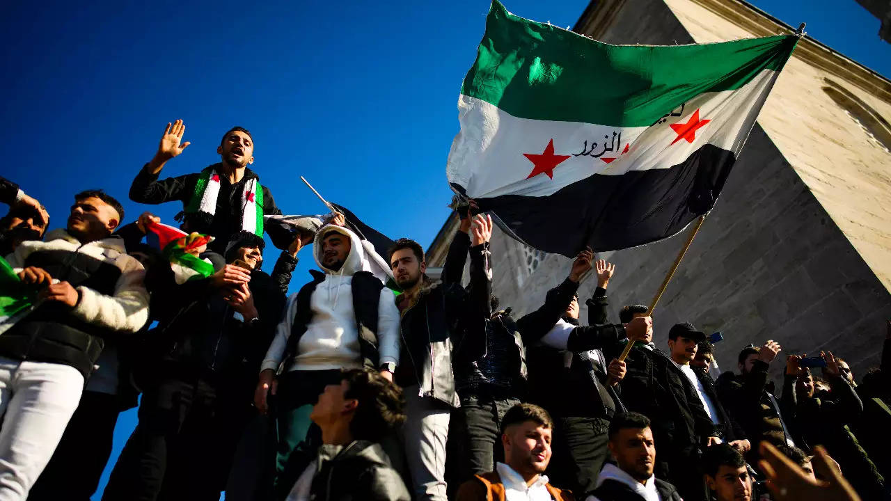 Syrians celebrate fall of Assad.