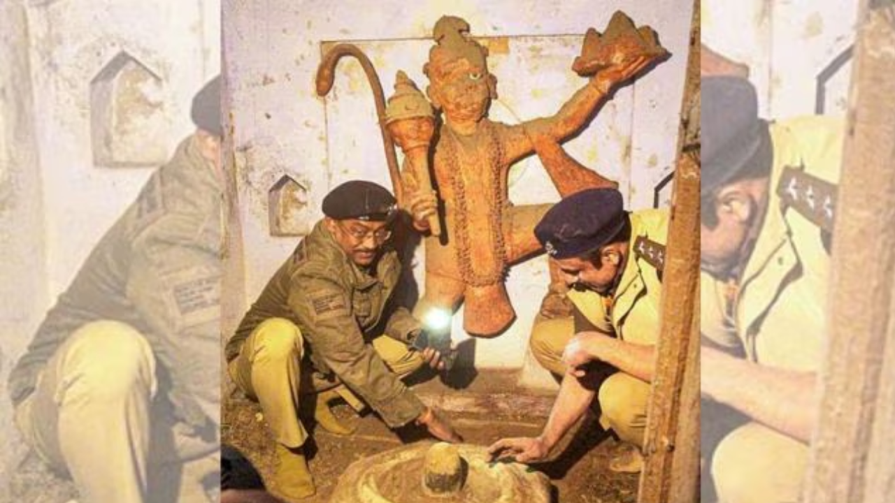 Security personnel inside a temple that was reopened after 46 years, at Khaggu Sarai area in Sambhal district,