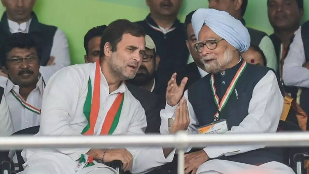 Rahul Gandhi with Manmohan Singh