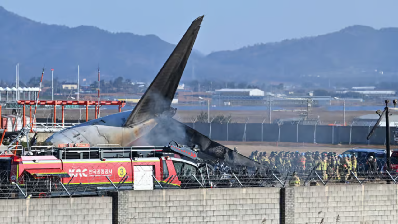 Rescue team members at Muan International Airport