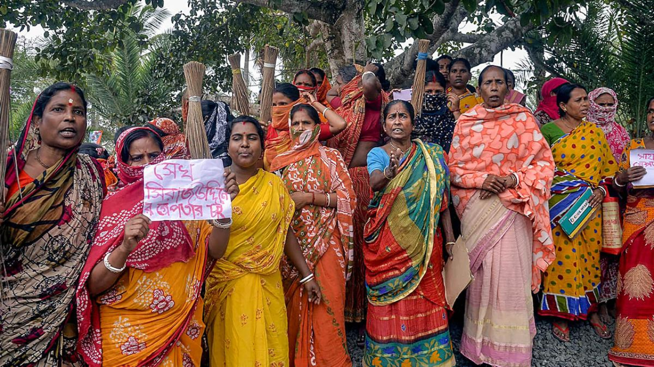 Women participate in a protest demanding the arrest of local TMC leaders over Sandeshkhali incident allegations, in North 24 Parganas district, on February 25, 2024.