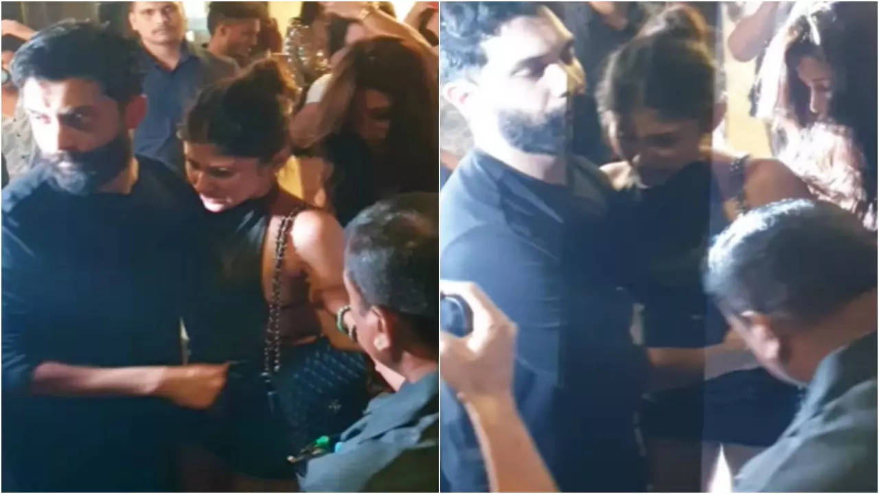 Mouni Roy Falls On Pavement While Exiting New Year Party, Husband Suraj Nambiar Rescues Her – Watch