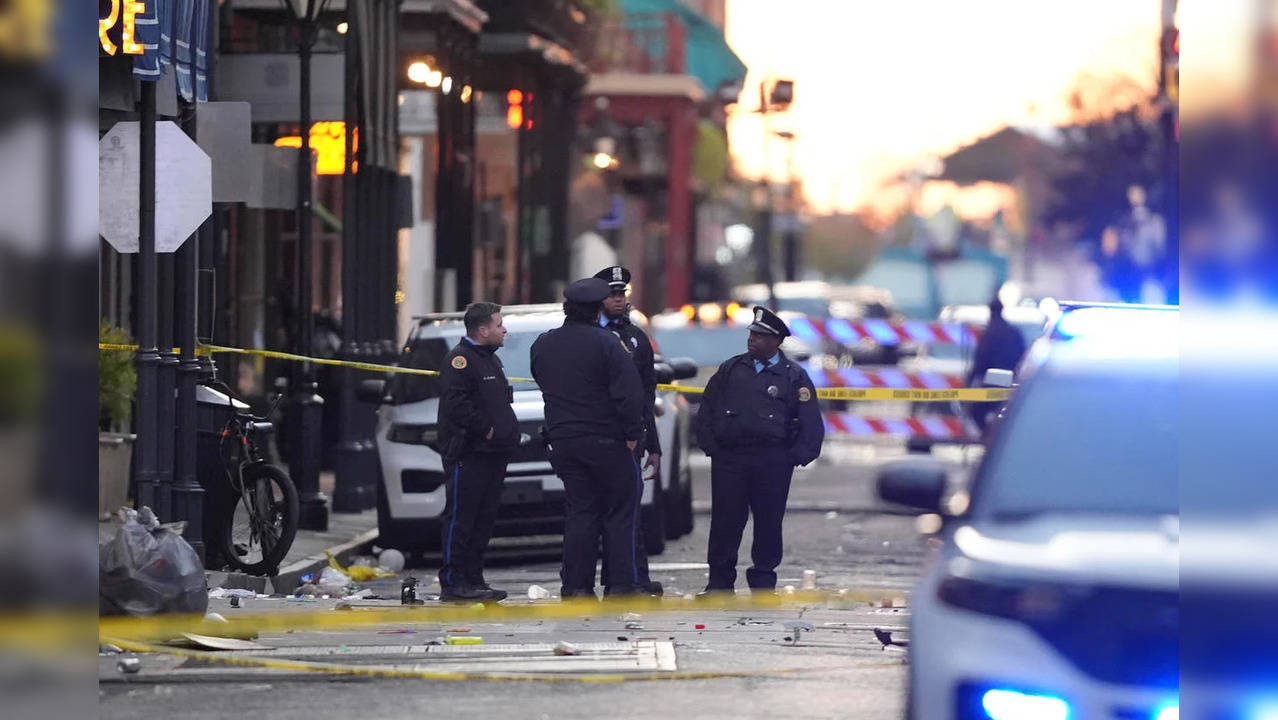 Emergency services attend the scene on Bourbon Street after a vehicle drove into a crowd on New Orleans' Canal and Bourbon Streets, Jan. 1, 2025, killing 10 people.