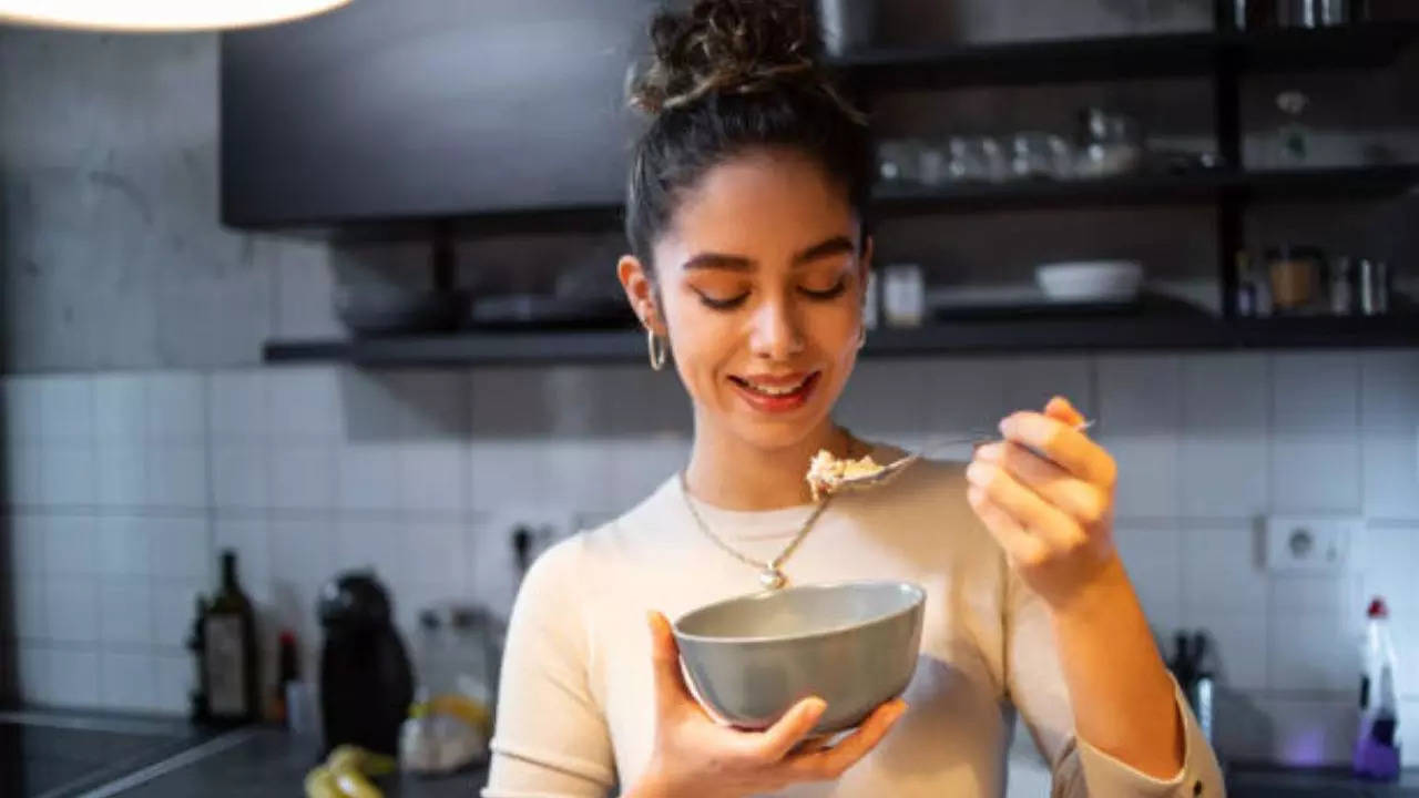 Eating oatmeal bowl as a Late Night Snack Helps You Get Over Sleep Troubles