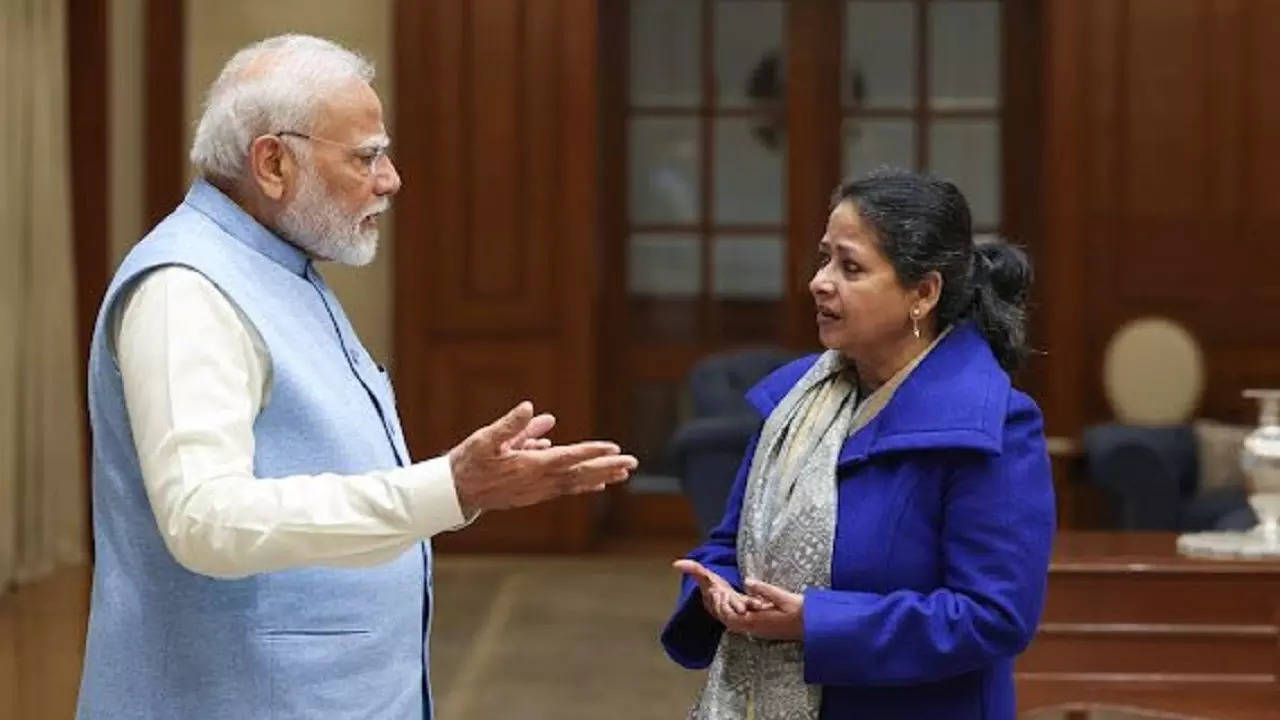 PM Modi and Sharmistha Mukherjee