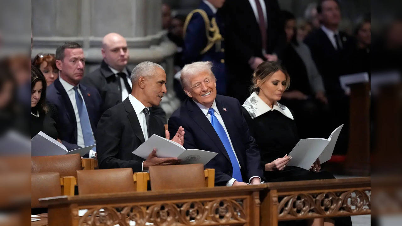 Donald Trump and Obama At Jimmy Carter Funeral.