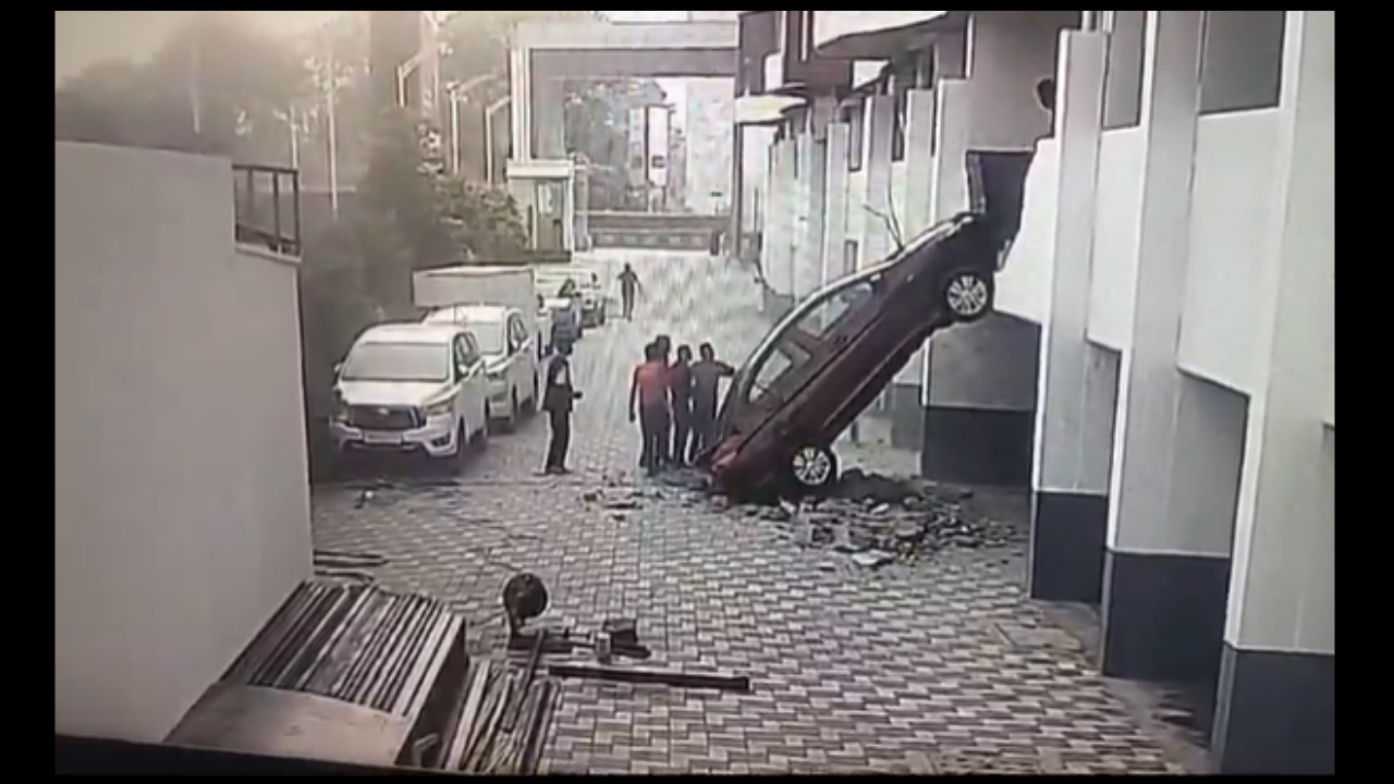 pune car accidently falls down from building first floor; spine chilling video goes viral watch