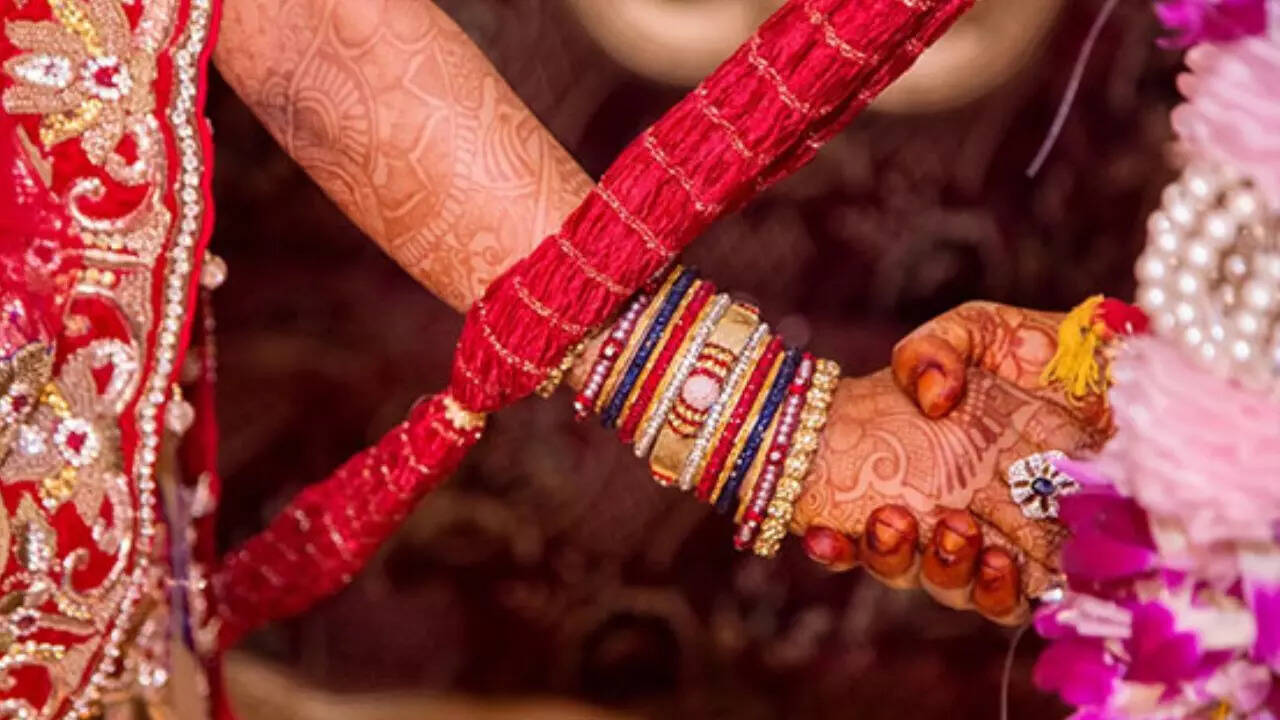 a wedding like no other: bride and groom tie knot at police station, cops act as baraatis
