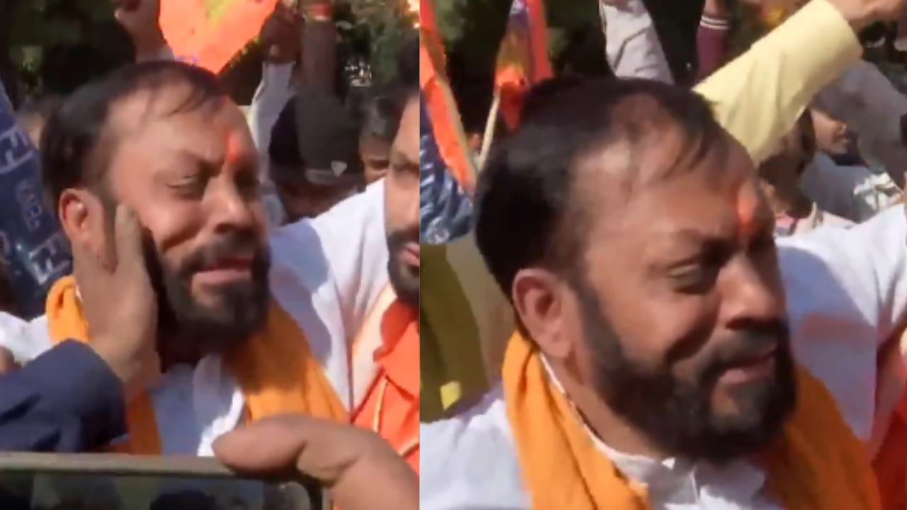 bjp worker in bengaluru 'gets emotional' as party leads in delhi election trends- video