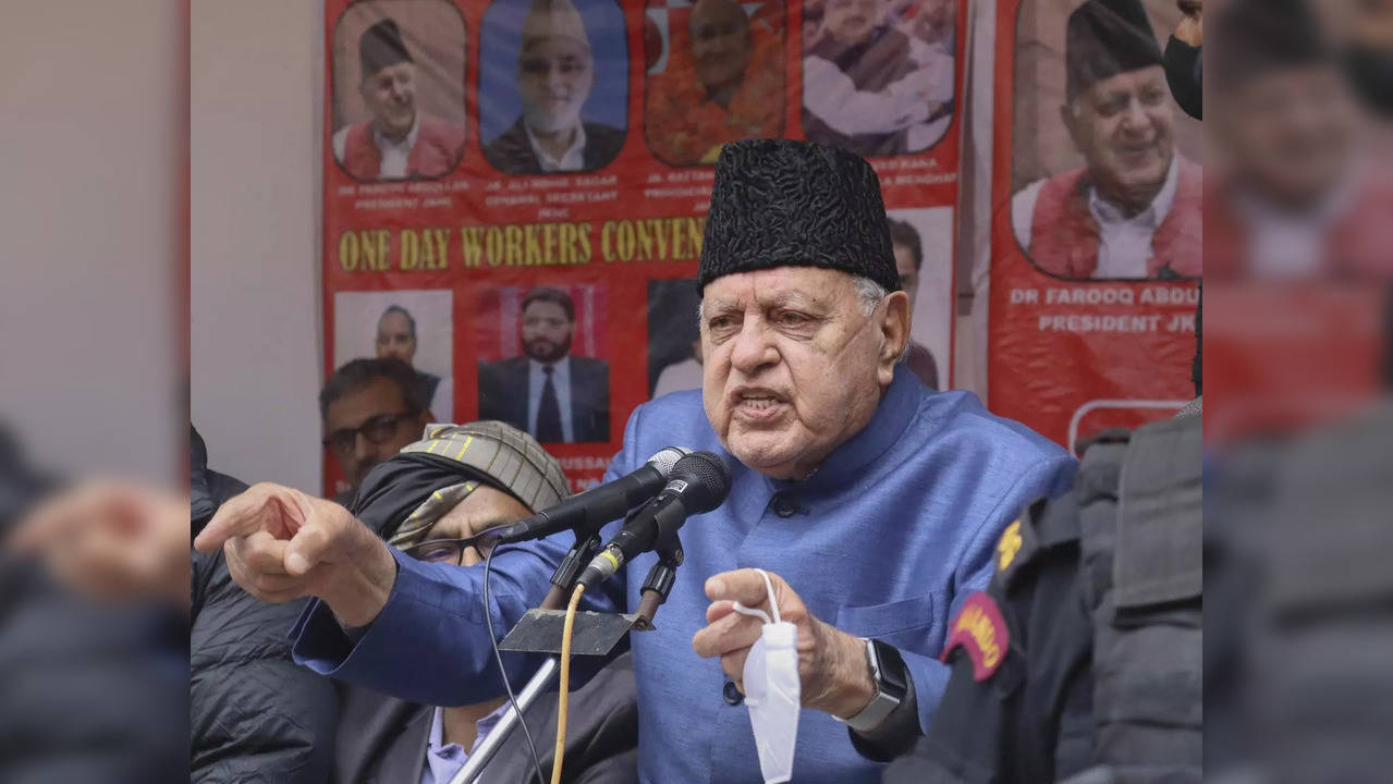 National Conference President Dr. Farooq Abdullah addresses during a pub...