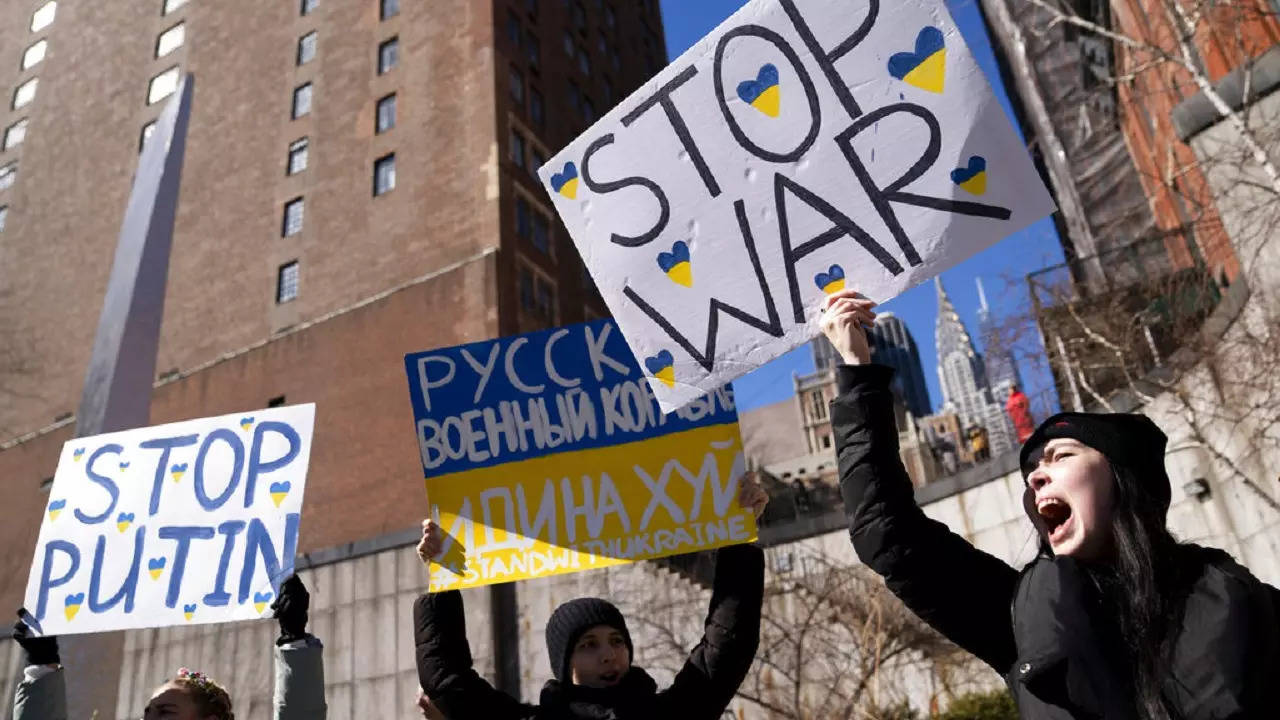 Demonstrators supporting Ukraine gather outside the United Nations during an emergency meeting of the U.N. General Assembly, Monday, Feb. 28, 2022, in New York.