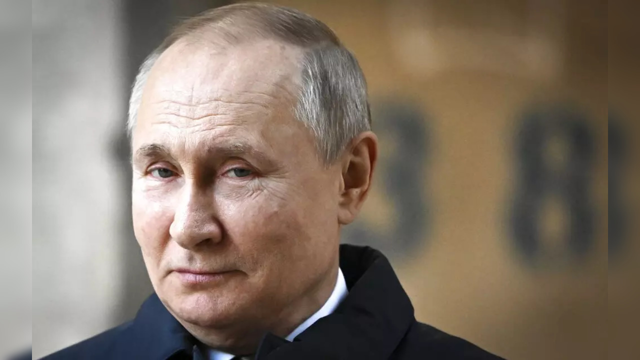 Russian President Vladimir Putin looks on as he visits the construction site of the National Space Agency on the premises of the Khrunichev State Research and Production Space Centre in Moscow