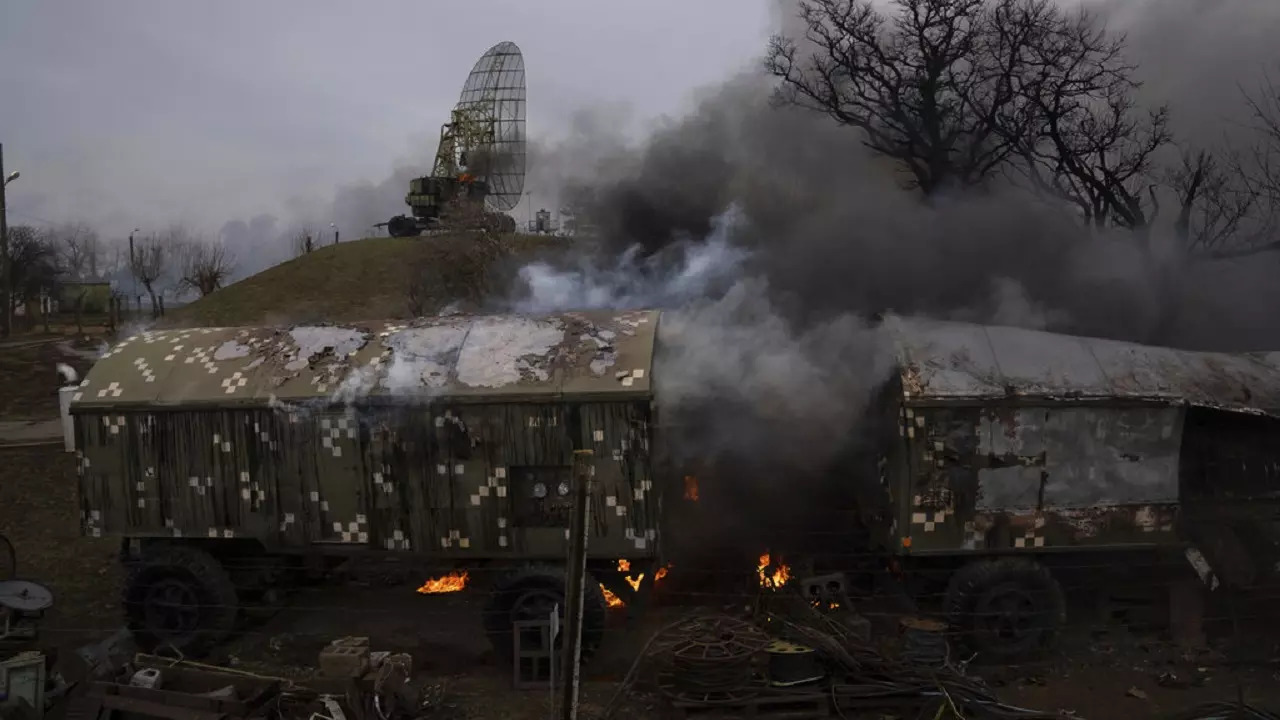 Smoke rise from an air defence base in the aftermath of an apparent Russian strike in Mariupol