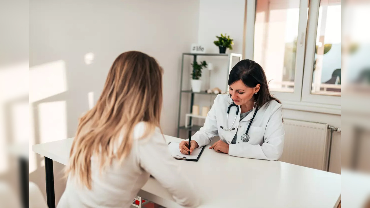 Woman patient doctor check up