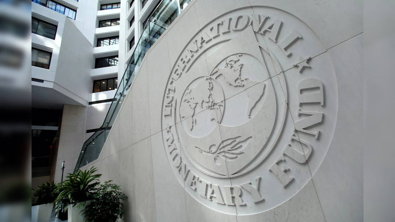 FILE PHOTO: The International Monetary Fund logo is seen inside its headquarters at the end of the IMF/World Bank annual meetings in Washington