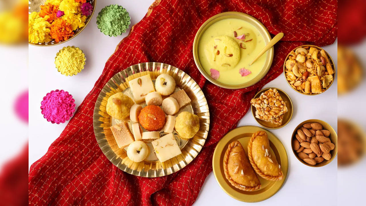 Holi peda barfi gujiya motichoor laddu rasmalai food feast