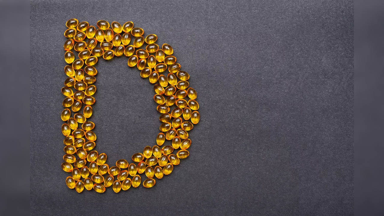 Vitamin D capsules in shape of alphabet D