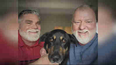 Dog abandoned for being 'gay' adopted by same-sex couple in North ...