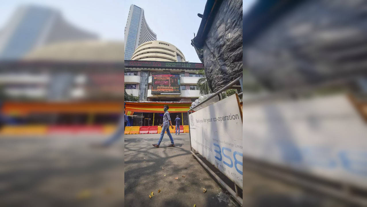 A pedestrian walks past the Bombay Stock Exchange (BSE) building as the ...