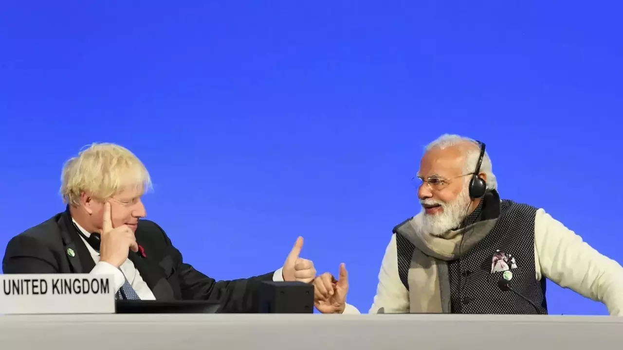 Prime Minister Narendra Modi with UK Prime Minister Boris Johnson PTI