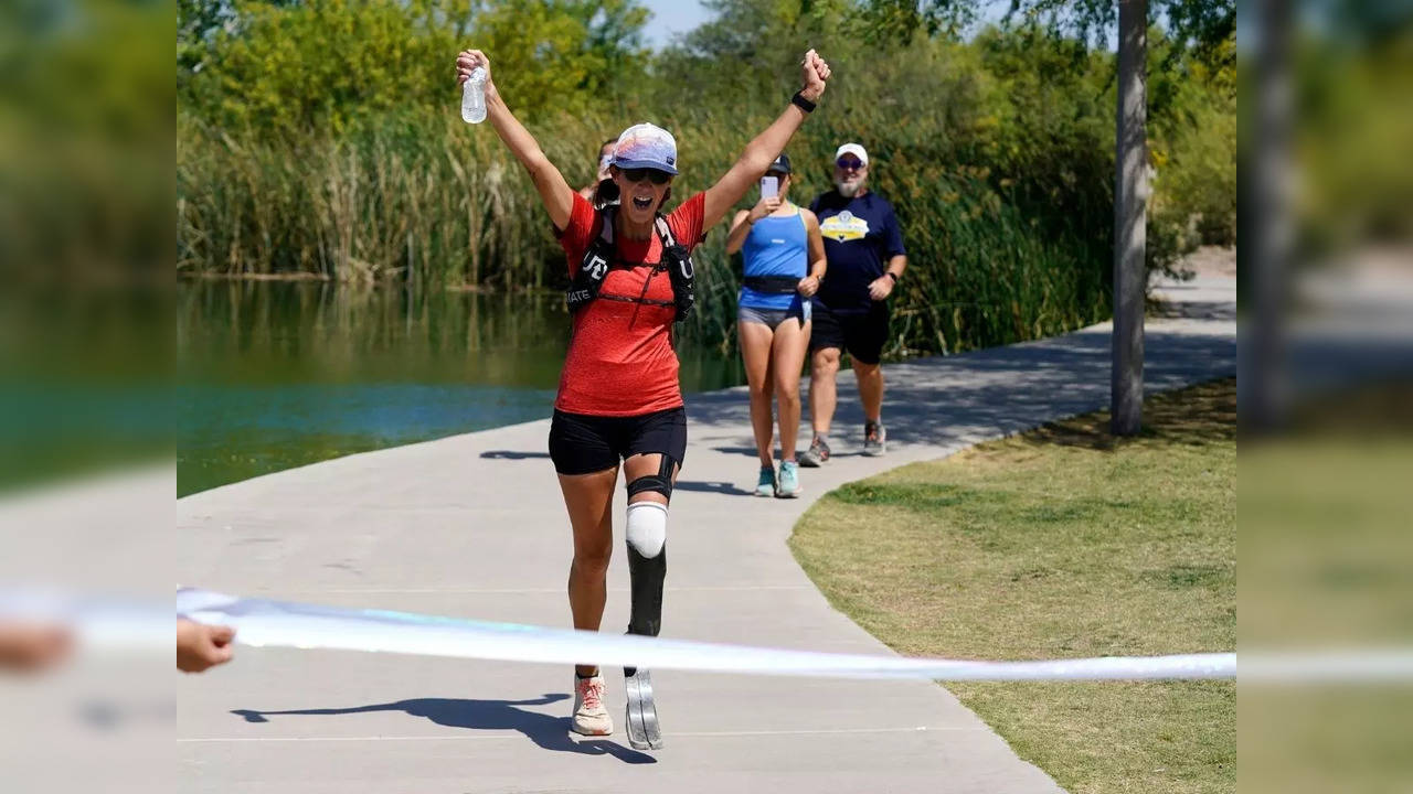 ​Jacky Hunt-Broersma finishes her 102nd marathon on April 28, 2022 at Veterans Oasis Park, Chandler, Arizona