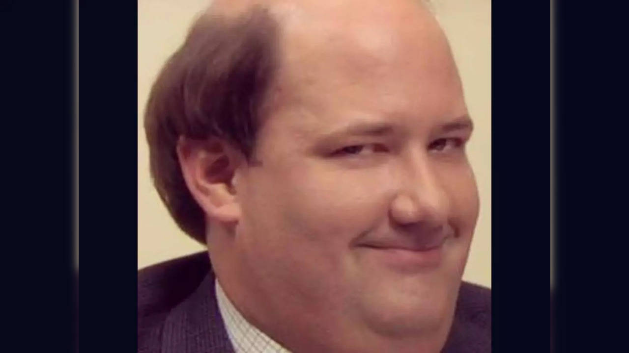 Kevin Malone's iconic smirk | Image courtesy: imgflip.com