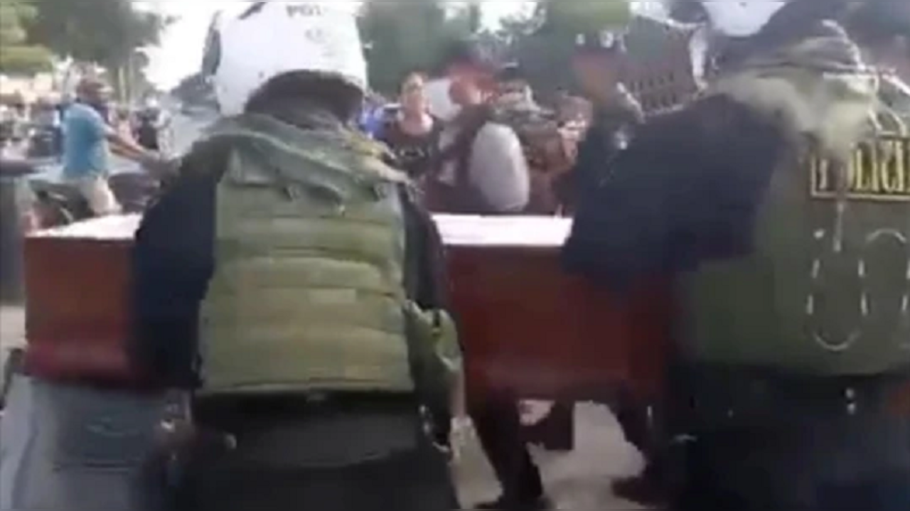 'Dead' woman bangs on her coffin to say she's alive