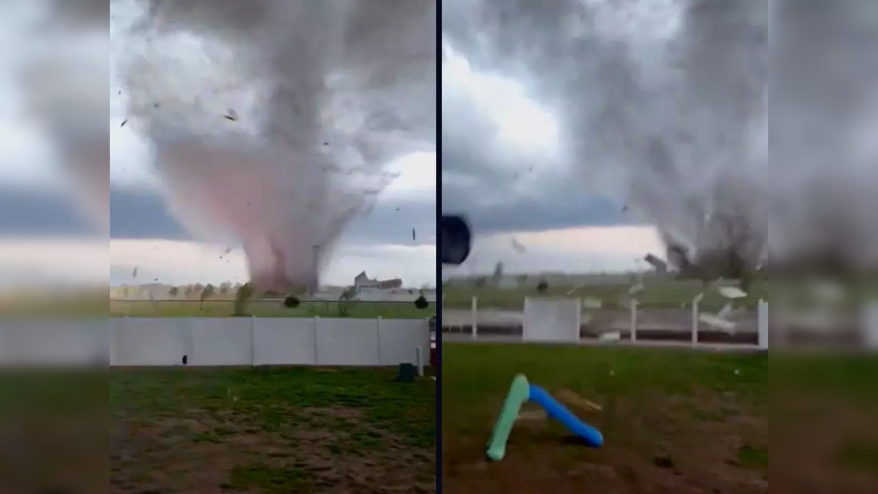 Tornado swallows up the yard of a man filming it