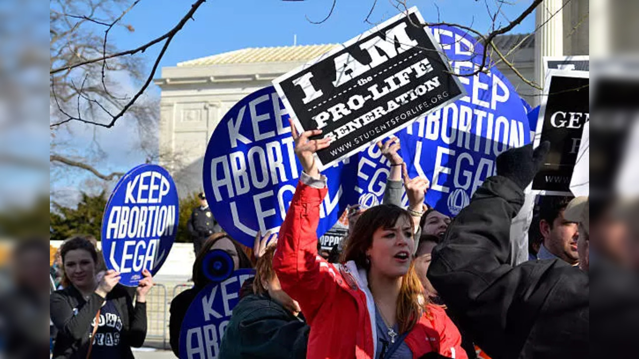 Pro-life demonstrator interrupts abortion rights campaign