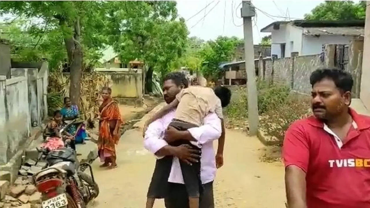 watch-dead body of 8-year-old boy carried on bike in andhra's nellore district