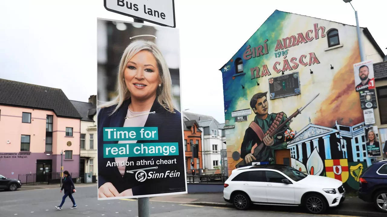 A Sinn Fein election poster hangs from a lamp post in West Belfast