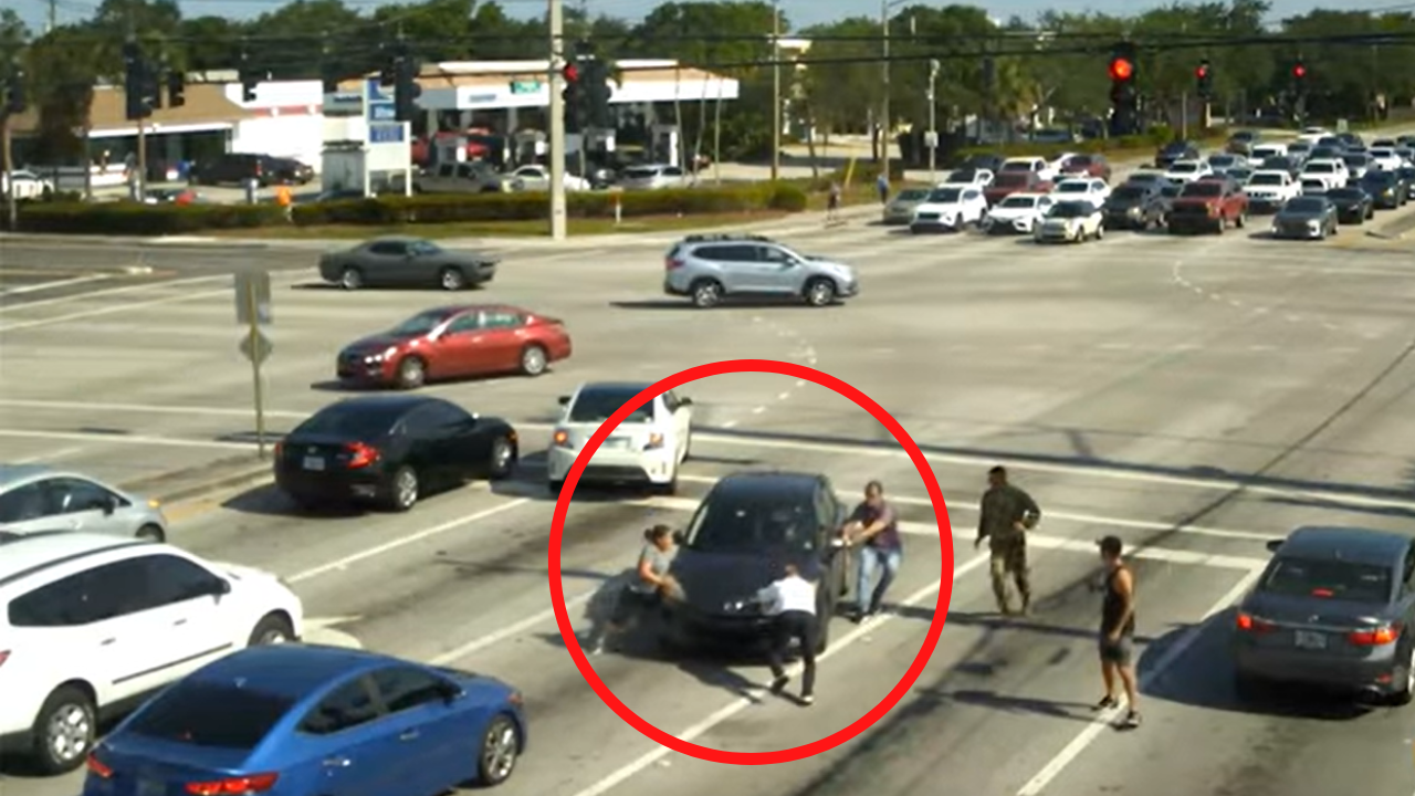 People stop car with bare hands to save woman who fell unconscious while driving