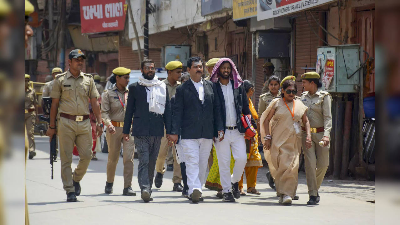 Varanasi: Officials leave after a videographic survey at Gyanvapi Masjid complex...