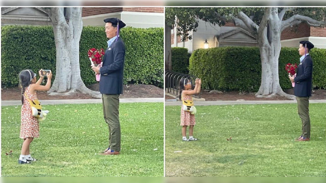 Little girl attends her father's graduation ceremony