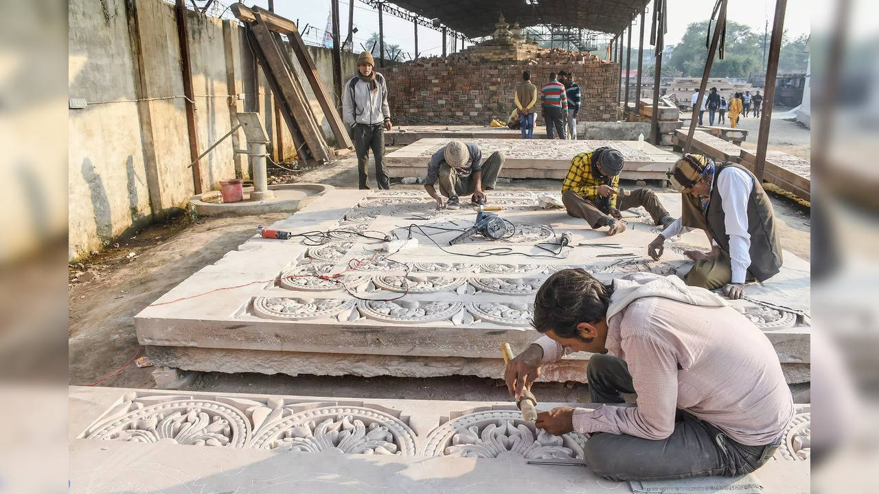 Ayodhya: A worker carves stone as part of construction of Ram Temple, in Ayodhya...