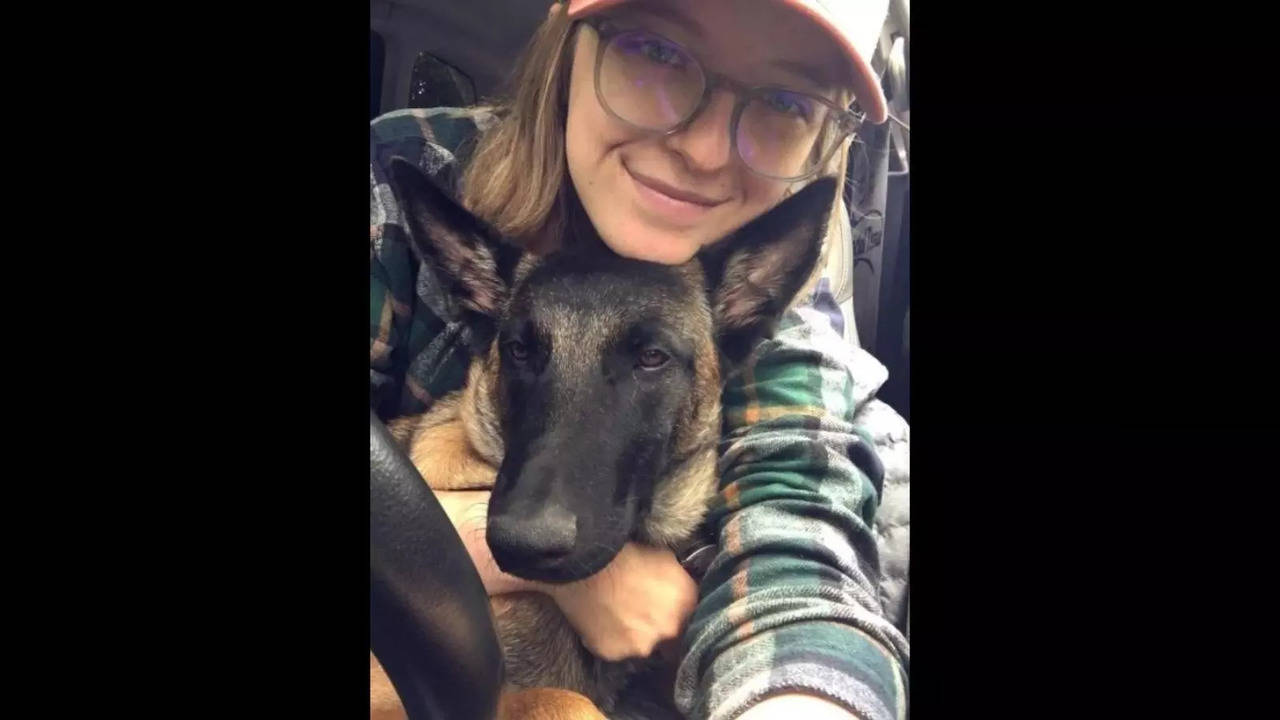 Erin Wilson, pictured with Eva, the pet dog who saved from a mountain lion attack | Image courtesy: Instagram/@eva_the_mal