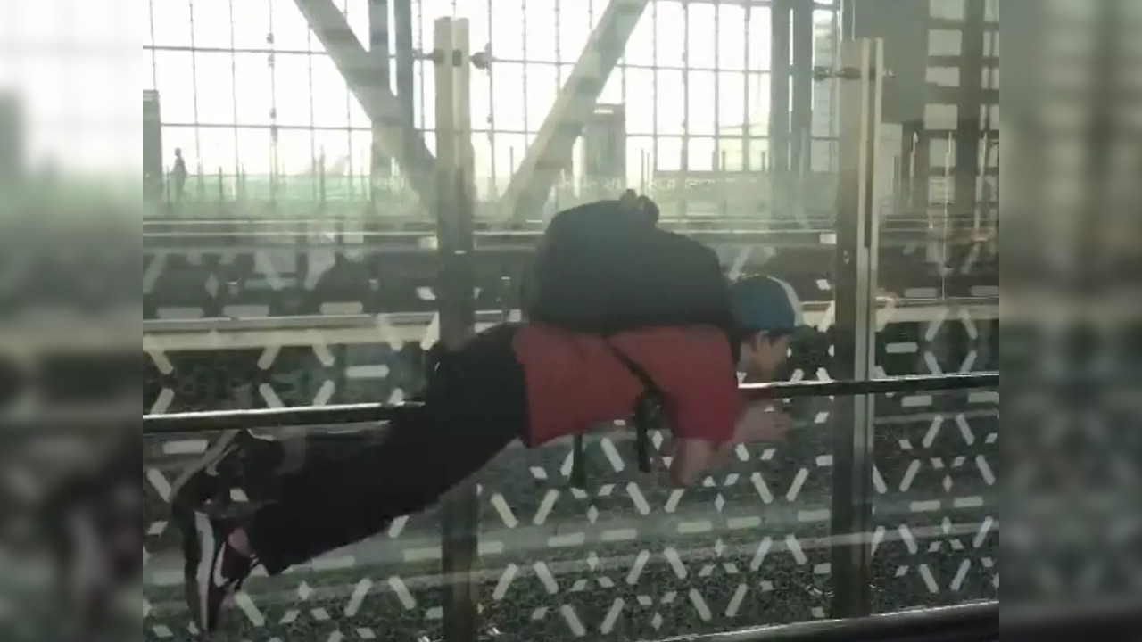 Boy flies like Superman at Qatar Airport | Image courtesy: Twitter