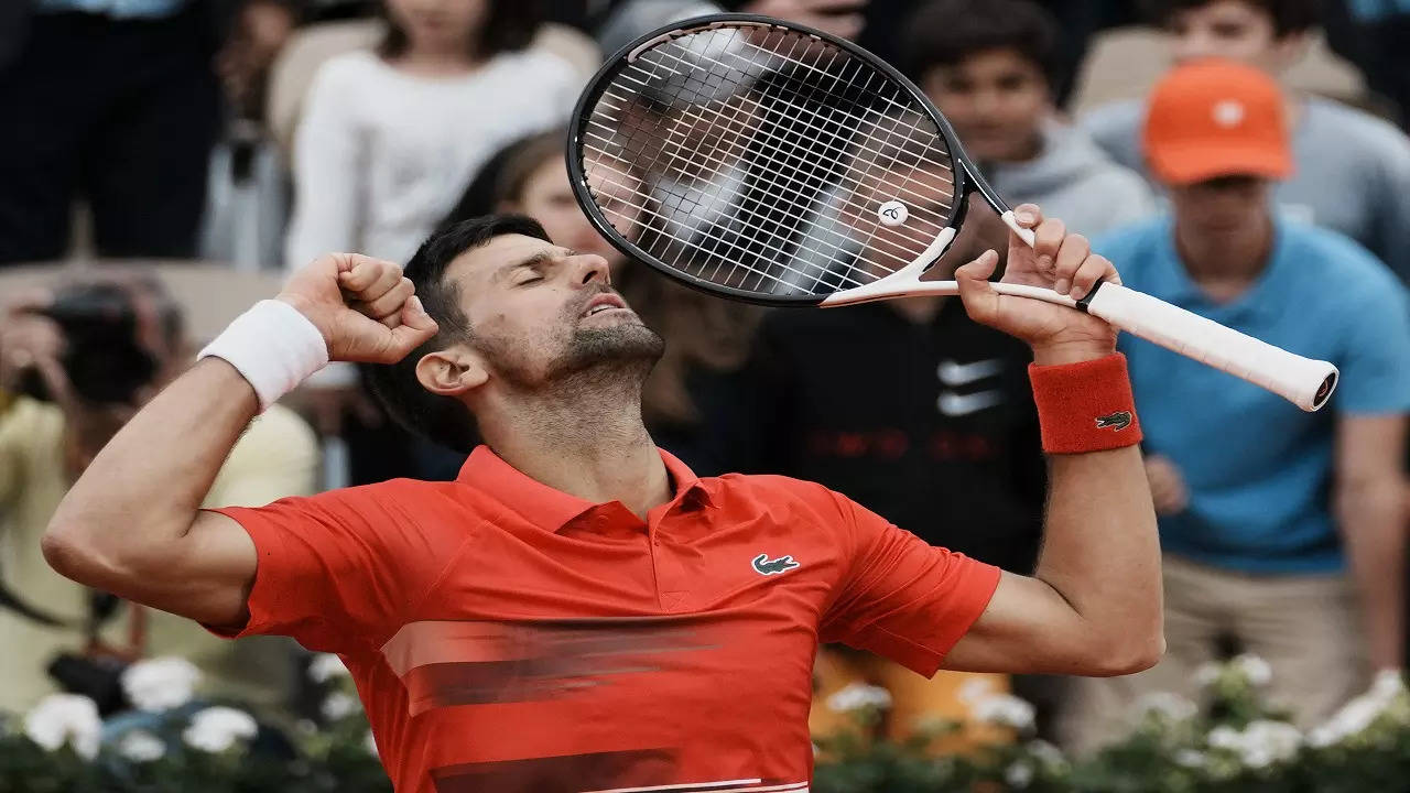 Reigning champion Novak Djokovic eased into the third round of the French Open