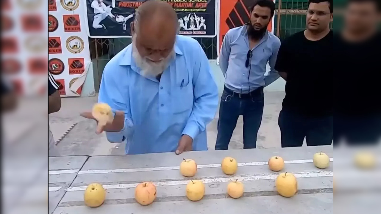 70-year-old Pakistani man crushes apples with his hand to break world record | Image courtesy: Facebook/Guinness World Records