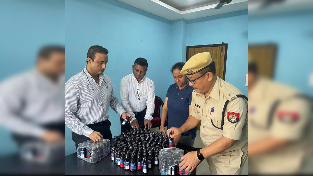 Guwahati police with the cough syrups