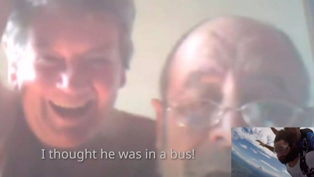 Skydiver vide0-calls parents while jumping off an aeroplane | Image courtesy: Youtube/HostelWorld