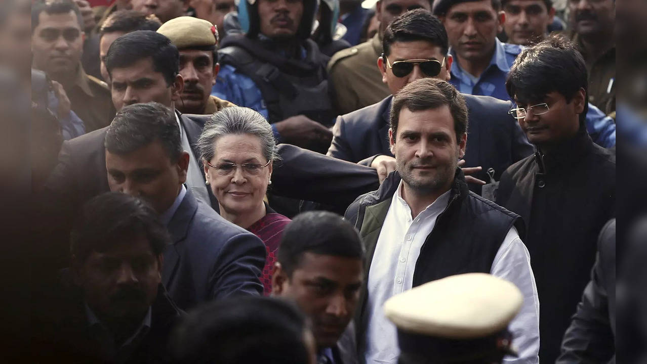 FILE PHOTO: Sonia Gandhi and Rahul Gandhi arrive at a court in New Delhi