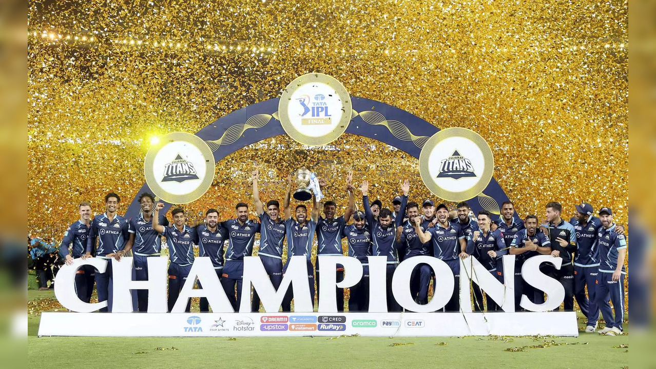 Gujarat Titans players with the IPL trophy after winning the final T2...