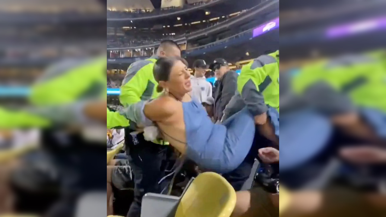 Dodgers fan being removed from the stadium | Picture courtesy: TikTok/@mirzalps; Twitter/@reddawg77089