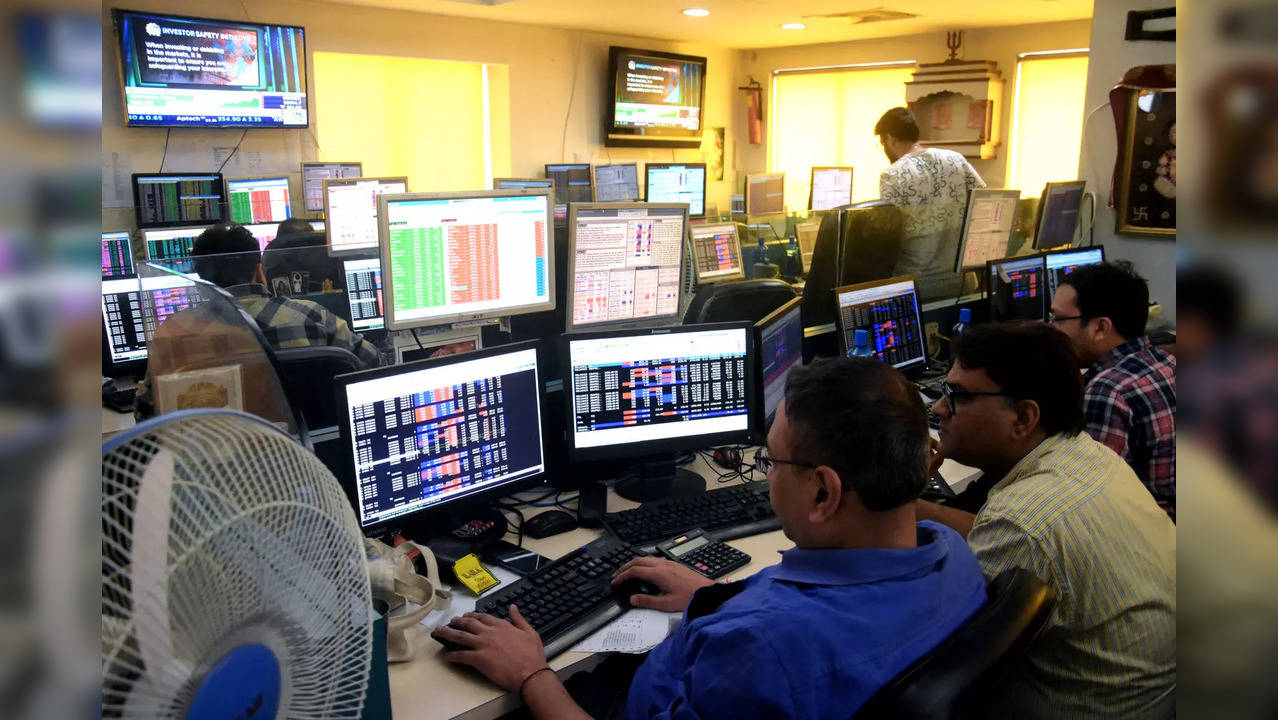 Sensex, Nifty trade flat amid mixed global cues; auto stocks gain